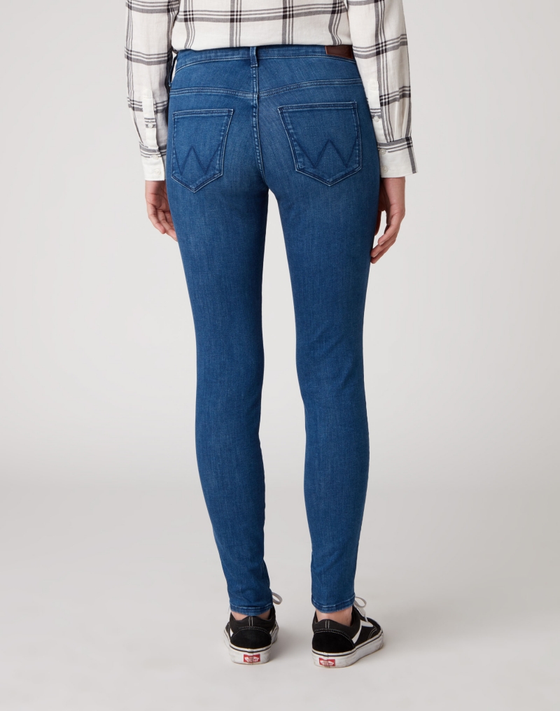 Pantalones vaqueros de mujer Wrangler skinny, modelo W28KWY116, de color tejano lavado a la piedra - 3 - La Casa Dels Pantalons
